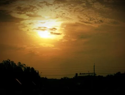 The sunset is setting in the west Фото