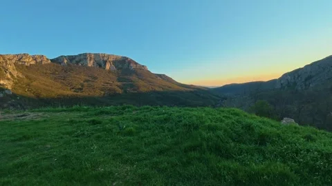 Sunset Shadow Timelapse - Creeping Shadows Over Canyon in Clear Twilight 4K Video stock 332614702