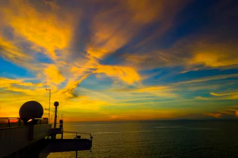 Sunset with ship radar silhoutte Stock Photos