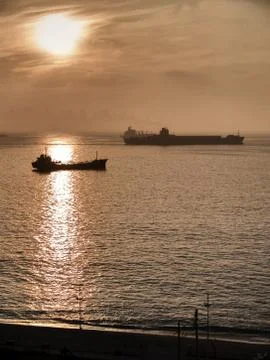 Sunset with ships Stock Photos