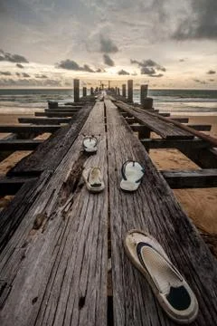 Sunset shoes on the bridge Stock Photos