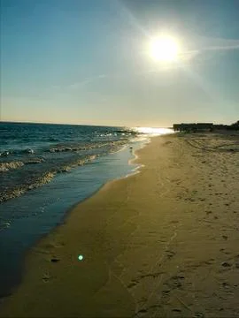 Sunset on Shoreline Stock Photos