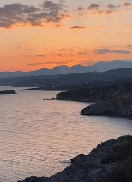 Sunset shoreline Stock Photos