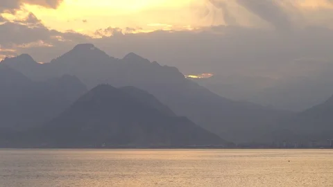 Sunset shot behind mountains Stock Footage 83794140