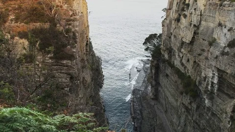 Sunset shot of devil's kitchen at eaglehawk neck in tasmania Stock Footage 72938143