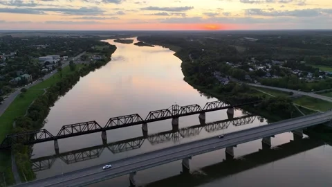 Sunset shot of North Saskatchewan River by Prince Albert, Canada Stock Footage 338358206