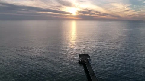 Sunset shot of San Clement Pier from a done Stock Footage 168650964