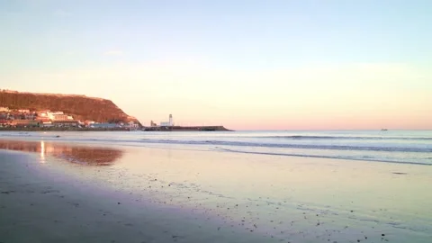 Sunset shot of sea waves on beach Video stock 167954479