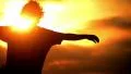 Sunset Silhouette 06 Man walking towards camera with open arms HD Footage