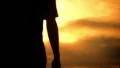 Sunset Silhouette 07 Man walking away HD Footage