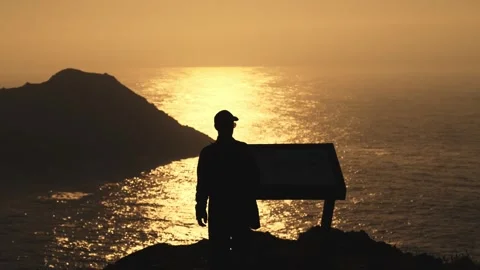 Sunset silhouette on ocean cliff, Berlenga Island, Portugal Stock Footage 320576808