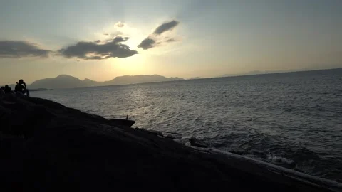 Sunset Silhouette by the Ocean Cliff 库存影片 263695508