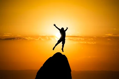 Sunset Silhouette on the peak Stock Photos