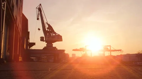 Sunset silhouette. time lapse. cranes container industrial industry business Vídeos de archivo 64538892