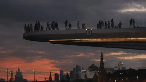 Sunset. Silhouettes of people walking on... | Stock Video | Pond5