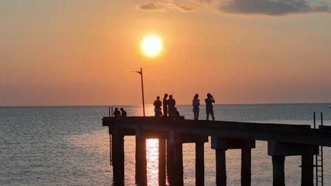 Sunset Silhouettes on Segenting Jetty in Batu Pahat Stock Footage 332737372