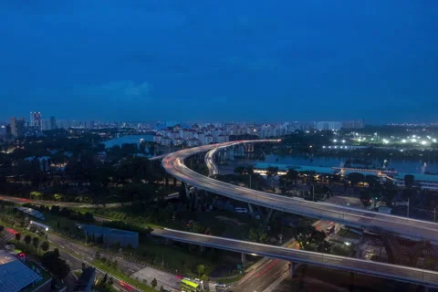 Sunset singapore high angle overhead bridge expressway car trails Stock Footage 151233816