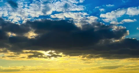 Sunset sky 4K timelapse with sunset sun Stock Footage 257666097