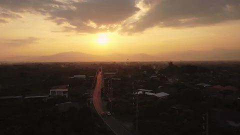 Sunset sky against the background of silhouettes of mountain and rural villages. Stock Footage 219679270