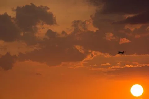 The sunset sky with airplane Foto stock