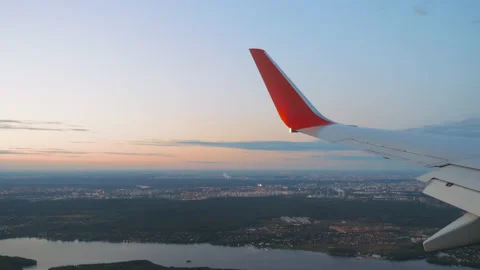Sunset sky and airplane wing Stock Footage 181089460