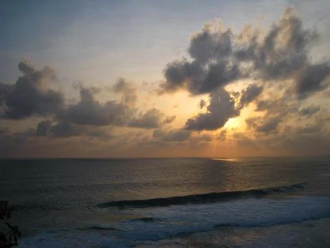 Sunset, sky and the beach Stock Photos