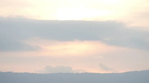 Sunset sky and clouds over hill or mountain background Stock Footage 219057487
