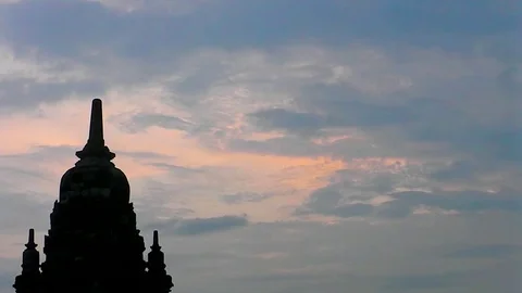 Sunset sky and silhouette Ancient Temple of Borobudur. The island of Java. Yogya 스톡 동영상 81857437