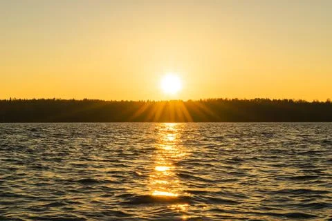 Sunset sky background. Dramatic gold sunset sky with evening sky clouds ove.. Stock Photos