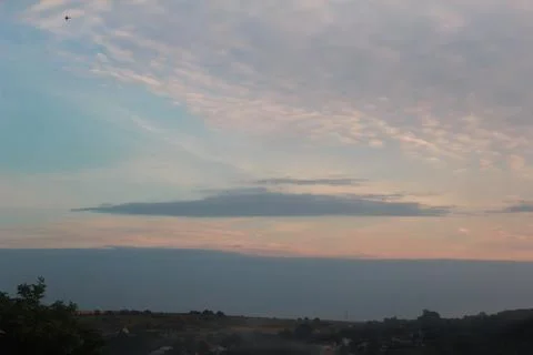 Sunset sky for background or sunrise and cloud in the morning. Stock Photos