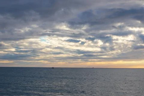 Sunset sky background over the Black Sea. Stock Photos