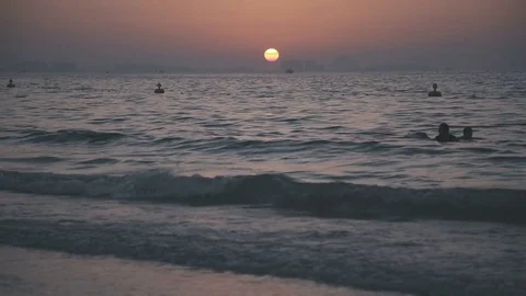 Sunset sky on the beach. The sun sets behind the horizon Stock Footage 71703586