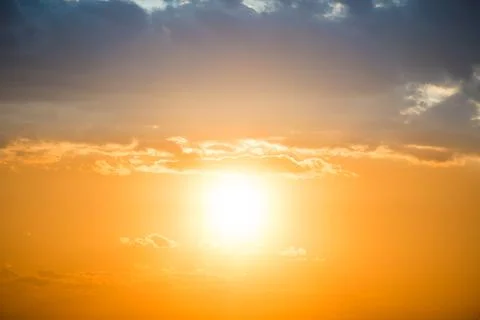 Sunset in the sky with big sun Stock Photos