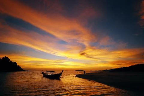 Sunset sky with boat Stock Photos