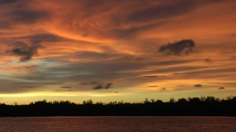 Sunset Sky  by the Borneo River Stock Footage 106061369