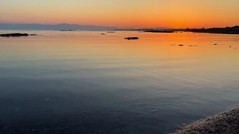 Sunset sky with clouds. Bright orange sun over the Mediterranean Sea. Stock Footage 289175231