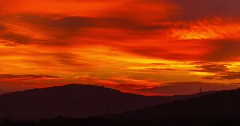 Sunset sky clouds cloudscape sunlight red orange sun light evening dusk twilight Stock Footage
