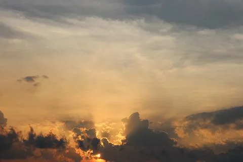 Sunset Sky Clouds in the evening with Red, Orange, Yellow and purple sunlight on Stock Photos