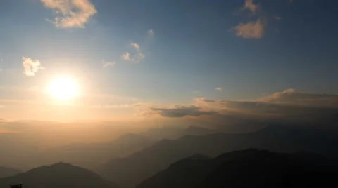 Sunset sky clouds moving Himalayas Nepal mountains time-lapse 4k video Stock Footage 64819569