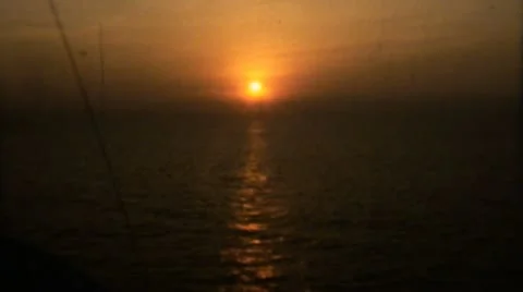 Sunset Sky Clouds Ocean 2 - Vintage Super8 Film Stock Footage 11496840