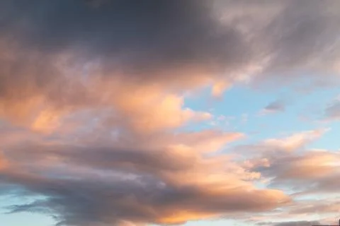 Sunset sky with clouds Stock Photos