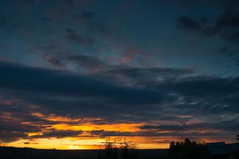 Sunset sky clouds. Sky clouds in the sunset. Stock Photos