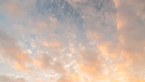 Sunset Sky Clouds Timelapse. Vivid Yellow, Orange, Pink Cumulus and Cirrus Stock Footage 221352591
