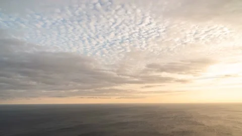 Sunset Sky Clouds Timelapse. Vivid Yellow, Orange, Pink Cumulus and Cirrus Stock Footage 221610013