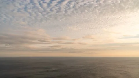 Sunset Sky Clouds Timelapse. Vivid Yellow, Orange, Pink Cumulus and Cirrus Stock Footage 221676548