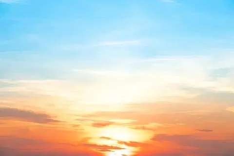 Sunset sky with colorful clouds over horizon Stock Photos