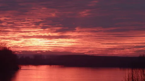 Sunset sky colors covered by clouds timelapse on the river Vídeo Stock 44988738