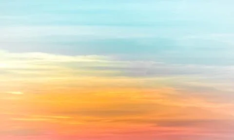 Sunset sky - colourful clouds and sky - blue, yellow, orange and red Foto stock