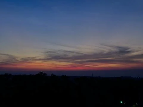 Sunset sky with dark clouds in the abstract background Stock Photos
