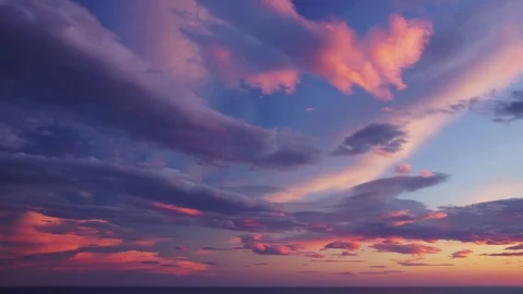Sunset sky with different colored clouds Stock Footage 77006870